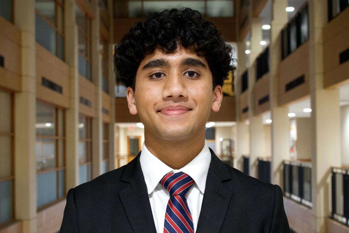 Utkarsh in front of balcony of offices